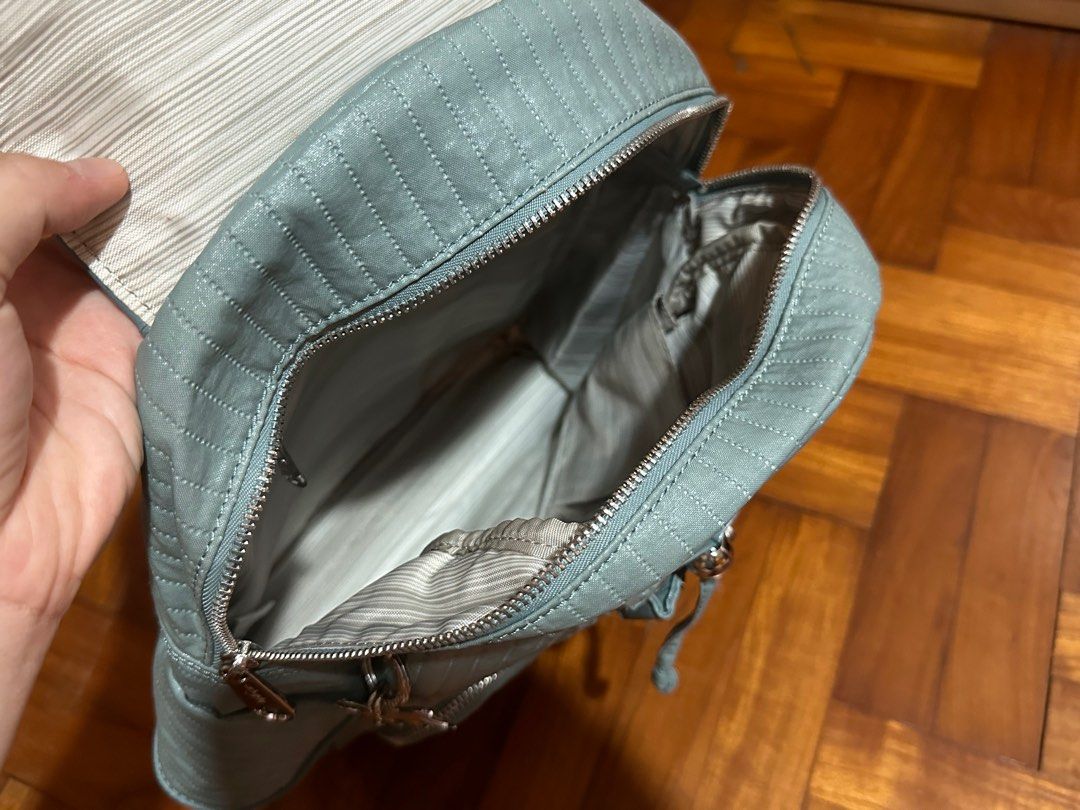 Kipling Backpack (Category: Backpacks) located in Singapore. Submitted by limmyyyyy (Listing ID 1288306328, Image 4). Description: Mint green, used only a few times. No defects, zippers working well. Bag height approx 34cm excluding the flap Original colours as shown in photos 4, 5 and 6. PICK UP IN MOUNTBATTEN or arrange own delivery.