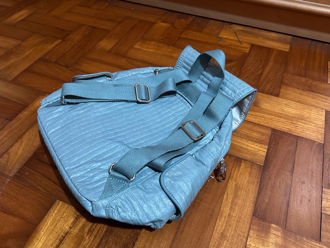 Kipling Backpack (Category: Backpacks) located in Singapore. Submitted by limmyyyyy (Listing ID 1288306328, Image 7). Description: Mint green, used only a few times. No defects, zippers working well. Bag height approx 34cm excluding the flap Original colours as shown in photos 4, 5 and 6. PICK UP IN MOUNTBATTEN or arrange own delivery.
