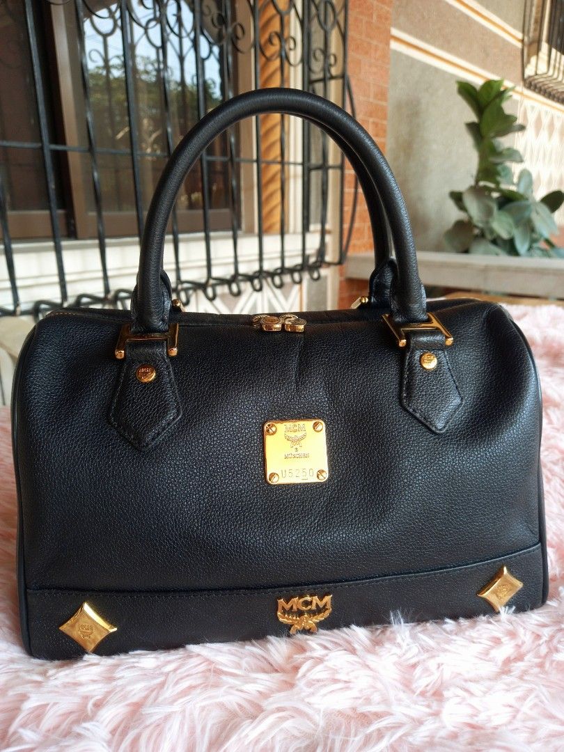MCM Leather Doctors Bag (Category: Luxury Bags & Wallets) located in Guagua. Submitted by WearDTwinsCollections (Listing ID 1288322979, Image 1). Description: MCM Leather Doctors Bag Item is preloved, please expect minor signs of usage: scratches, rubs, fadings, tarnished/faded hardwares, some broken and/or cut pipings. Turnable screw, may etiketa (Made in Korea).