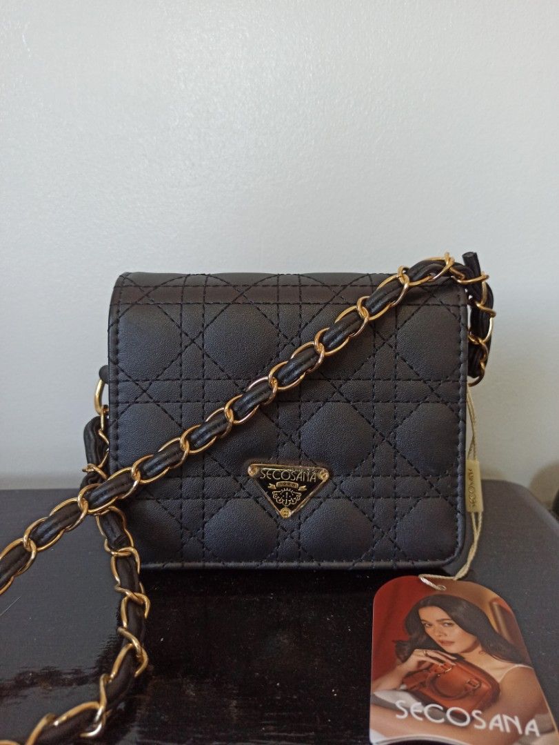 Secosana black micro bag (Category: Luxury Bags & Wallets) located in Bulacan. Submitted by planetbeauty.ph (Listing ID 1288348601, Image 1). Description: Brand new Secosana micro bag. 💕Highlights:💕 ✅Stylish, elegant and gorgeous bag ✅Ideal bag for leisure time or events ✅Designed for hands-free ease ✅Good Durability ✅Easily match up with casual or formal dressings ✅ Actual photo posted.L-12 cm,W- 7cm , H- 15 cm.