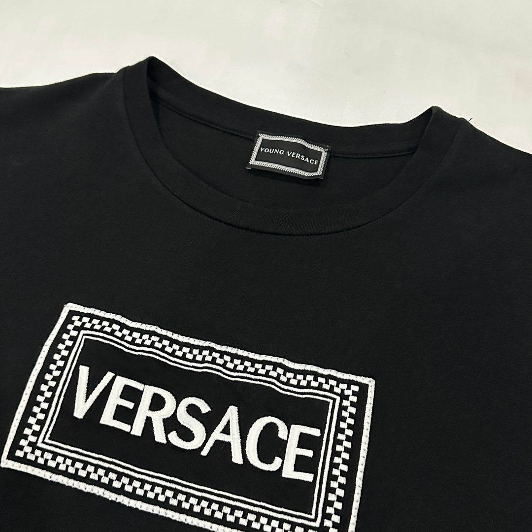 Versace Logo Shirt (Category: Shirts) located in Quezon City. Submitted by ishdeclutters (Listing ID 1288359161, Image 3). Description: Condition: 9.8/10 Color: black with embroidered logo Size: XS-S womens / teens 12 Material: Cotton Brand Style ID: YVFTS295Y0001.