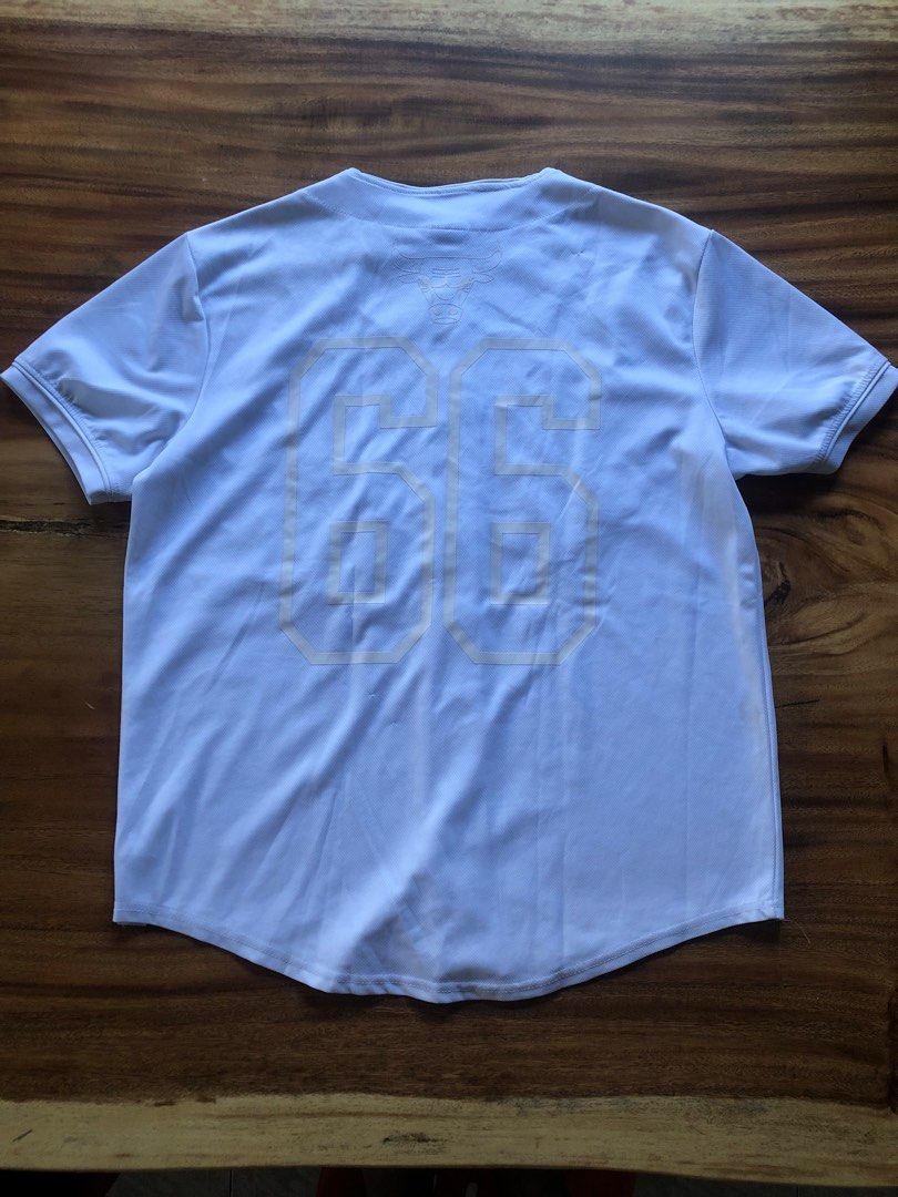 Vintage Chicago Bulls Baseball Tee (Category: Tshirts & Polo Shirts ) located in Pasig City. Submitted by maplemart (Listing ID 1288252537, Image 3). Description: Vintage Chicago Bulls Baseball Tee - 23 x 27.5 - Tagged L - Embroidered Bulls spellout and Bulls logo in the front, #66 tagged at the back - Very nice retro piece! - Theres a small red stain near the buttons (havent really tried removing this though) and washable dirt near the bottom - 