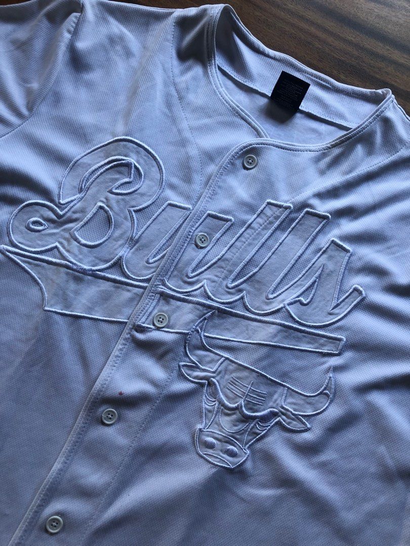 Vintage Chicago Bulls Baseball Tee (Category: Tshirts & Polo Shirts ) located in Pasig City. Submitted by maplemart (Listing ID 1288252537, Image 1). Description: Vintage Chicago Bulls Baseball Tee - 23 x 27.5 - Tagged L - Embroidered Bulls spellout and Bulls logo in the front, #66 tagged at the back - Very nice retro piece! - Theres a small red stain near the buttons (havent really tried removing this though) and washable dirt near the bottom - 