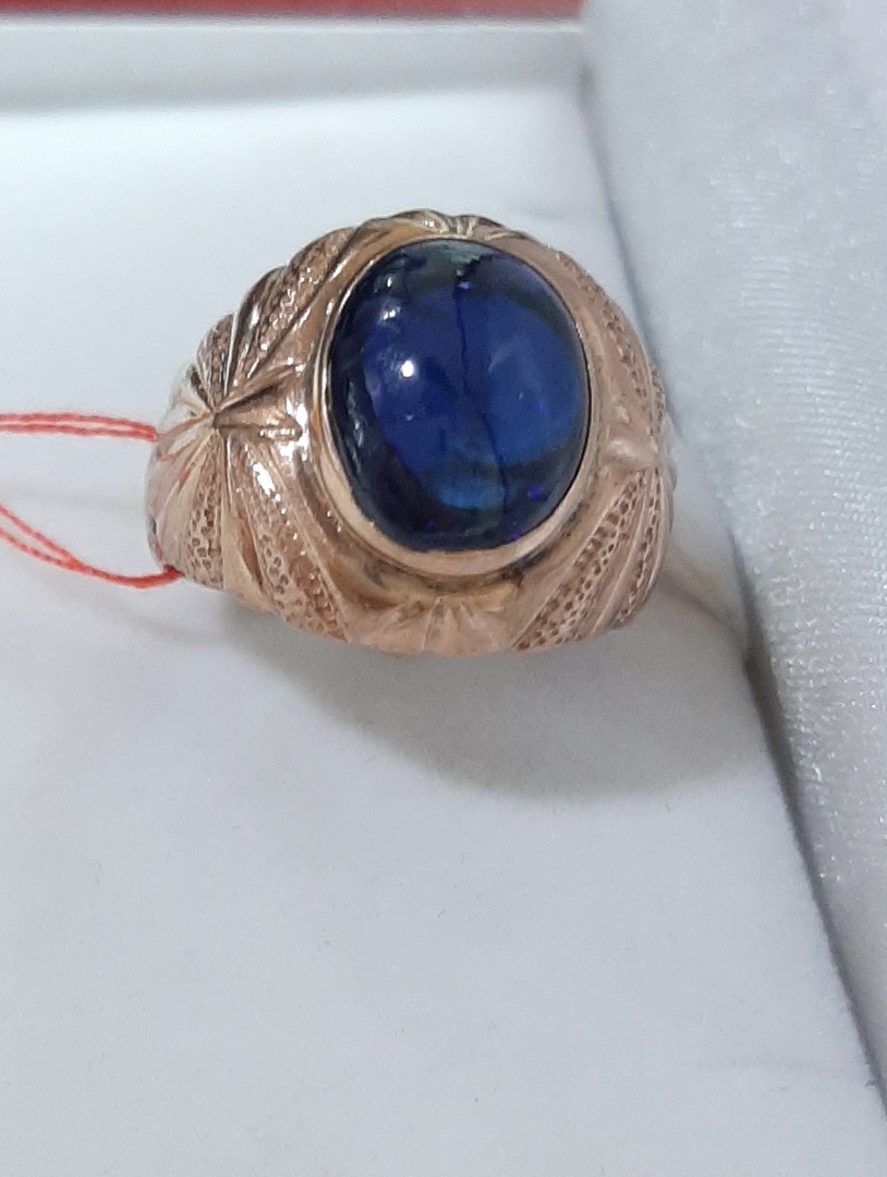 Gold ring with best sale blue stone