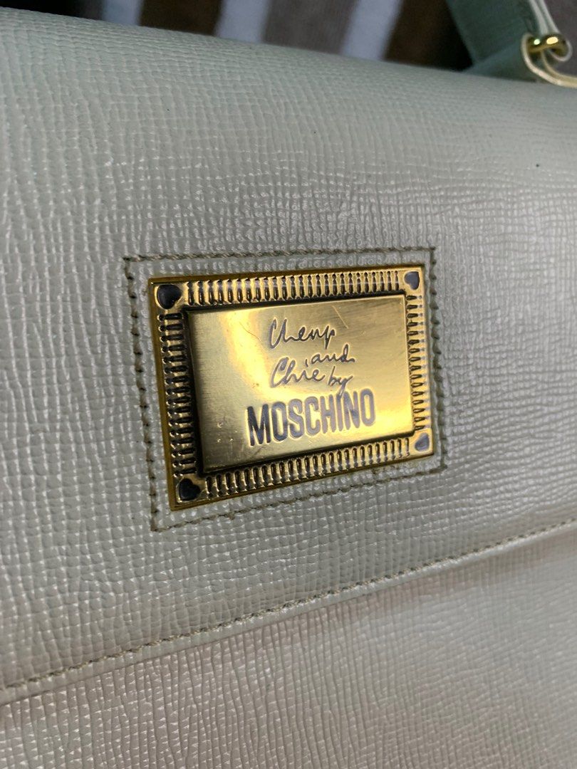 Auth moschino 2way vintage leather bag (Category: Luxury Bags & Wallets) located in Cabanatuan. Submitted by mjluxxejapan (Listing ID 1288628074, Image 2). Description: No lp pls.genuine leather.off white color.good condition.2way crossbody.super pretty.small sz approx 10”x7.5”meas.