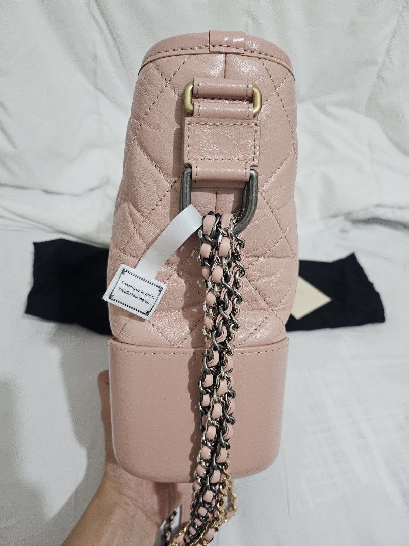 Chanel Gabrielle Medium (Category: Luxury Bags & Wallets) located in Mandaluyong City. Submitted by mapinsere (Listing ID 1288551798, Image 2). Description: medium size light pink in color 9/10 condition guaranteed authentic bought from a reputable seller with dustbag and care cards rush but no lowballers please. please check photos for details..