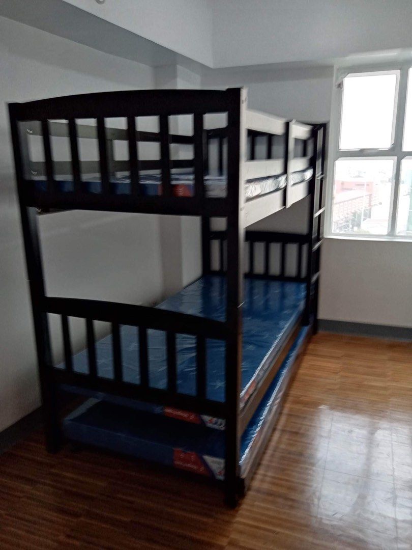 Double Deck with Pullout Bed (Category: Bed Frames & Mattresses) located in Manila. Submitted by michaelpchua33 (Listing ID 1288559983, Image 2). Description: Material: Malaysian Wood Size: 36x75 SINGLE Color: Wenge Mattress sold separately.