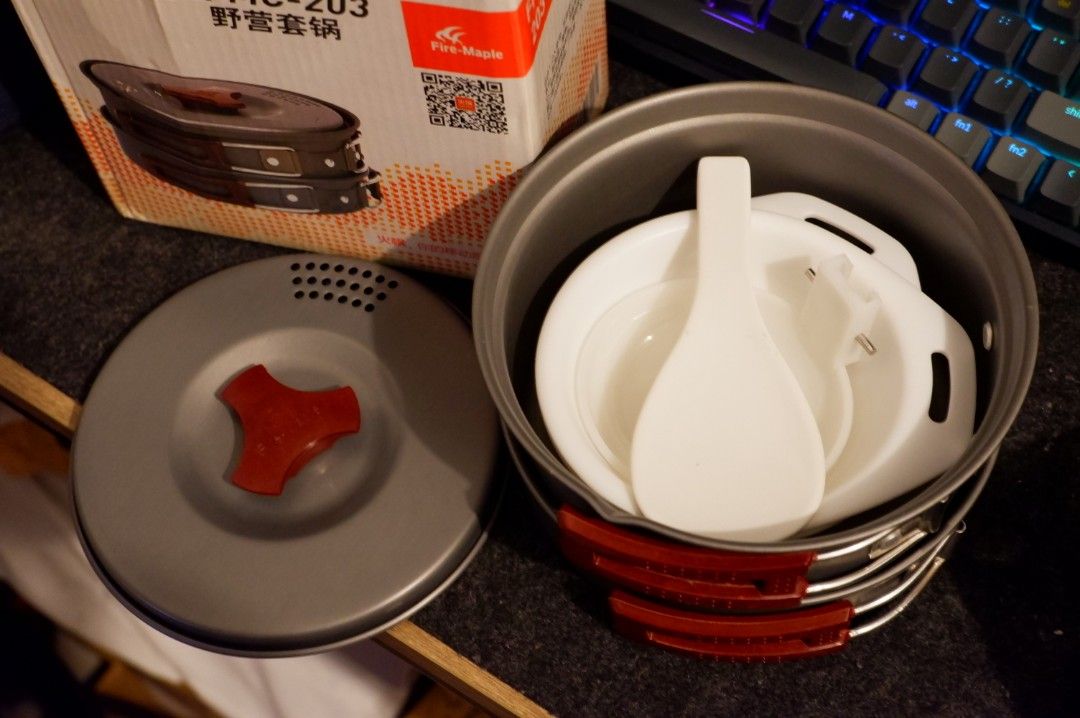 Fire Maple FMC-203 1-2 Persons Aluminium Cookware Set (Category: Hiking & Camping) located in Makati City. Submitted by jxyms (Listing ID 1288641844, Image 2). Description: Used only twice in Borawan and Pulag. Unused 2x bowls & 2x spoons..