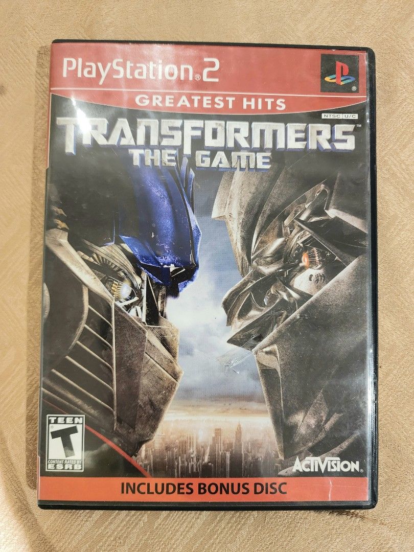 Transformers for PS2 (Category: PlayStation) located in Mandaluyong City. Submitted by chan.ningtatum (Listing ID 1288559634, Image 1). Description: For Sale! Transformers Good Working Condition. Checkouts via Shope e and Laz ada Available Shipping: Lalamove, Grab, Toktok. Meet ups: Mandaluyong and San Juan City..