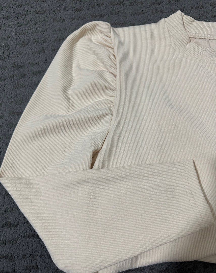 Basic Tunic (Category: Tops) located in Singapore. Submitted by mrs_sincerity (Listing ID 1288848392, Image 3). Description: Basic Tunic with slit. ( Slit about 56cm long. ) Colour Cream. Material Soft Ribbed. Puffed sleeves. Ptp 50-60cm. Arm hole 27-30cm. Length 113cm. Impulse buy at $24. Letting go at affordable price. No nego. Self collect. Thank you..