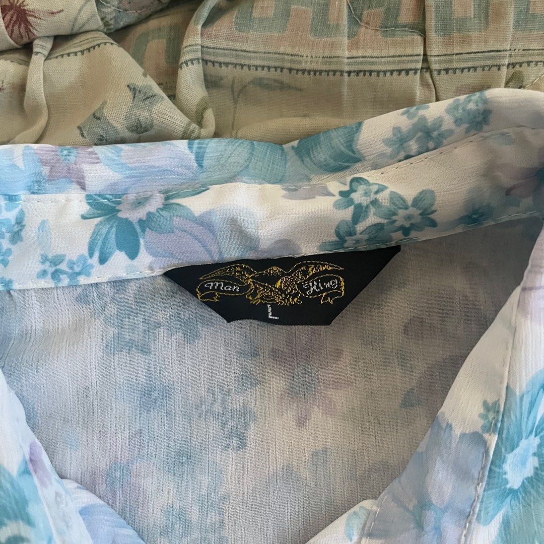 Blue floral Polo (Category: Others Tops) located in San Pedro. Submitted by cayerms (Listing ID 1288710522, Image 2). Description: Lightly used Brand: Man King Large on tag 24in width x 24in length No flaw .