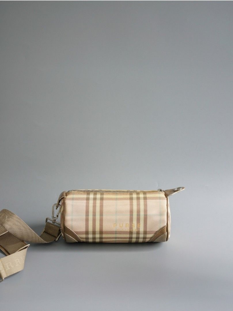 Burberry Papillon Barrel Bag (Category: Luxury Bags & Wallets) located in Taguig. Submitted by pursemaison (Listing ID 1288849891, Image 2). Description: Burberry Papillon Barrel Bag Php 30,000 CONDITION: Like New condition with creasing on the strap pad RATING: 9.8/10 INCLUSIONS: dust bag, detachable & adjustable strap, and Entrupy certificate Modes of Payment: Cash BDO credit card (Up to 12 mos installment with interest) Layaway Paypal Accepted