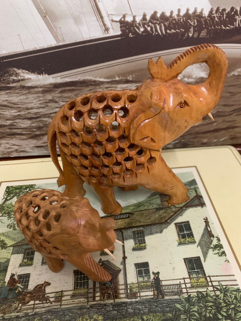 Wooden carved elephant with baby inside 2025