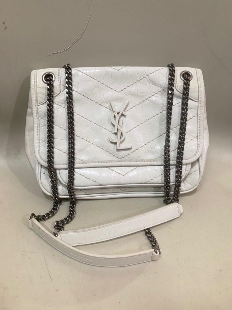 Ysl niki bag best sale fake vs real