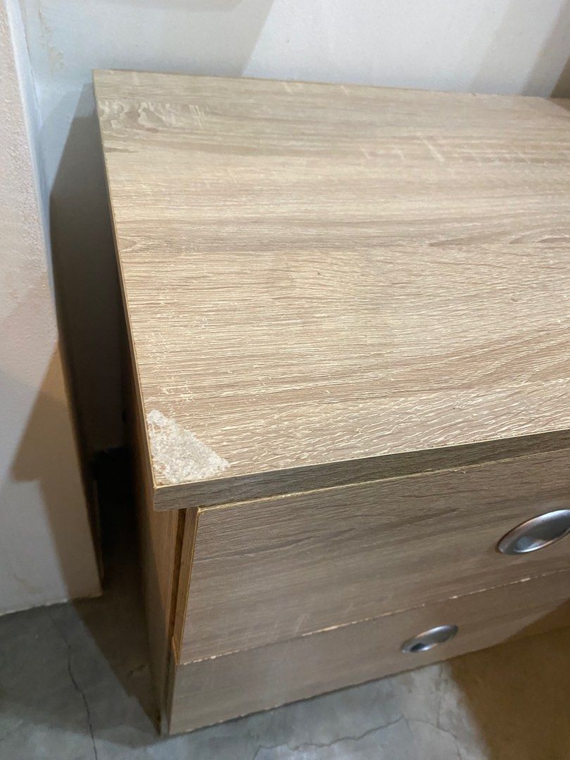 Bedside Table (Category: Tables & Sets) located in Singapore. Submitted by mmmlt (Listing ID 1289014414, Image 3). Description: Other than the edge of the table, everything still in good condition. Functions well as its purpose. .