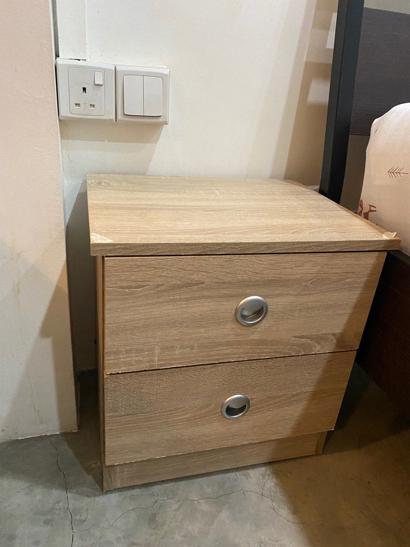 Bedside Table (Category: Tables & Sets) located in Singapore. Submitted by mmmlt (Listing ID 1289014414, Image 1). Description: Other than the edge of the table, everything still in good condition. Functions well as its purpose. .