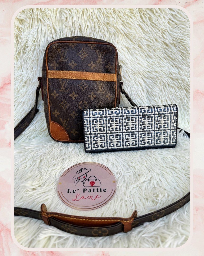 Bundle❣️LV Danube & Givenchy Wallet (Category: Luxury Bags & Wallets) located in Las Pinas. Submitted by Le.Pattie.Luxe (Listing ID 1288977516, Image 1). Description: 🎉Bundle Sale🎉 Vintage LV Danube + Free Givenchy Long Wallet 🖤Php 15k for both🖤 ▪️With signs of wear on the vachetta but monogram canvass still intact ▪️Peeling on the INTERIOR pocket ▪️Side chaps/side holder professionally replaced ▪️Both authenticated by B101Revue (see last pho