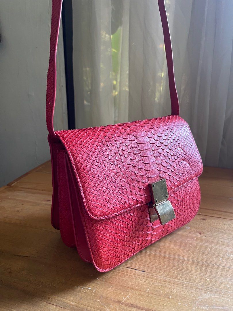 🎉 SALE Celine Classic Box Bag in Python Snake Skin (Category: Luxury Bags & Wallets) located in Makati City. Submitted by clidsdeclutter (Listing ID 1288977079, Image 3). Description: ACTUAL PICS POSTED Céline Classic Box Bag (Red) -Genuine/Real Python Snake Skin -Genuine Goat Skin Interior NO INCLUSIONS, BAG ONLY Not Guaranteed (NGA) Used a couple times; With minor unnoticeable press marks; signs of use in hardware & edge coat Price is Negotiab
