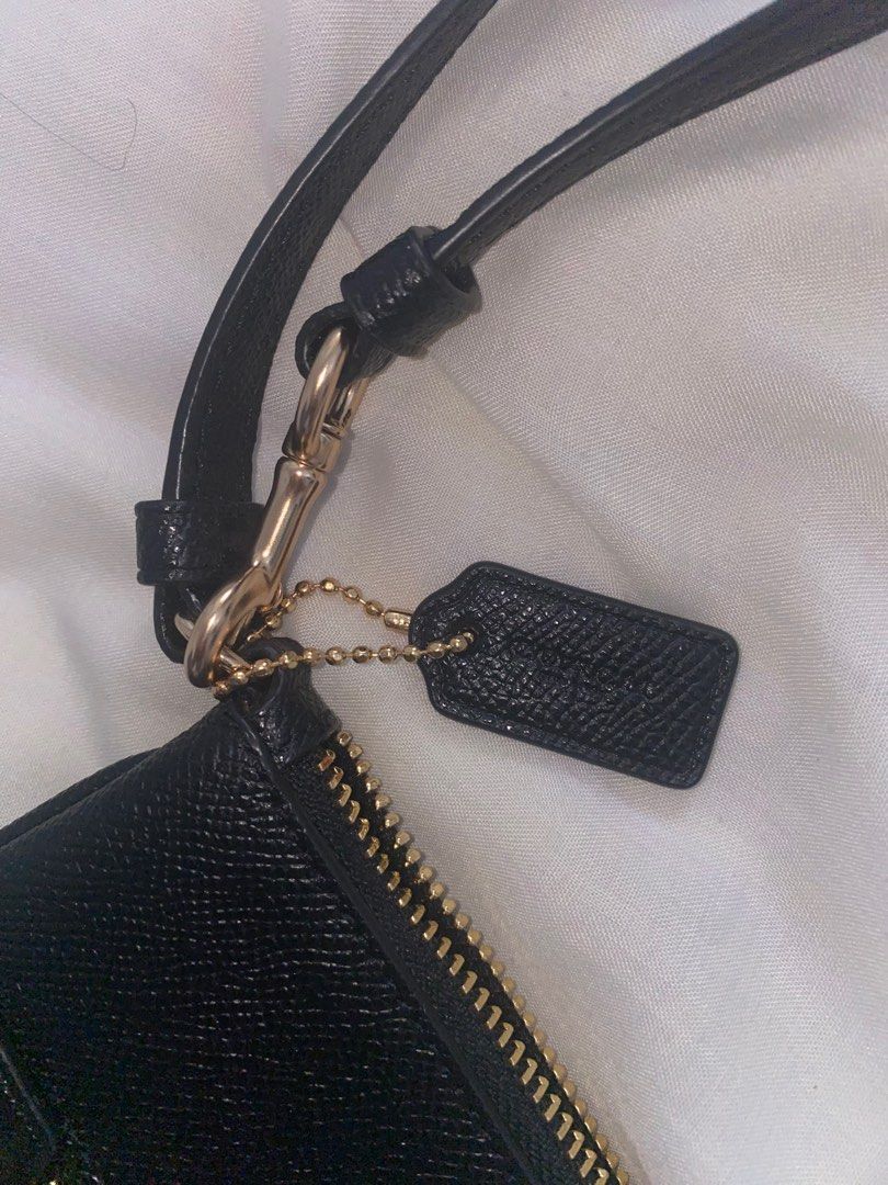 Coach Rowan Pouch | Wrislet/Wallet/Card Holder (Category: Wallets & Card holders) located in Angeles City. Submitted by persephoneee (Listing ID 1288979647, Image 3). Description: Rfs: Need FUNDSSSS, price is negotiable Crossgrain leather Two credit card slots Inside multifunction pocket Zip-top closure, fabric lining Outside zip pocket Detachable wrist strap 9 1/4” (L) x 6 3/4” (H) x 2” (W) Style No. C0113 Color: Black.