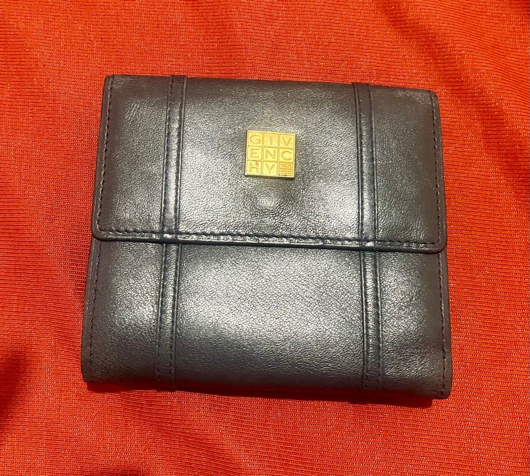 Givenchy Compact Wallet (Category: Luxury Bags & Wallets) located in Quezon City. Submitted by minekoh21 (Listing ID 1289133530, Image 1). Description: - Authentic Givenchy - 100% genuine leather - Very presentable and convenient to use specially when you are into small wallets - Just usual signs of use for a vintage wallet.