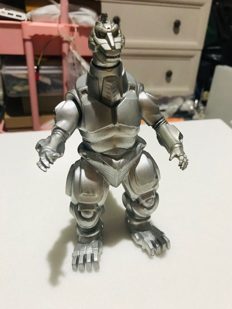 Godzilla movie MechaGodzilla (Category: Figurines & Statues) located in Las Pinas. Submitted by All.here_OnlineShop (Listing ID 1289106908, Image 1). Description: Godzilla movie MechaGodzilla 1993 Bandai release. No missing parts. 6-6.5 inches in height. 850 only. Shipping via LBC or JRS (Provincial) Lalamove (same day delivery within Metro Manila). Items are coming from Las piñas. *items are considered sold and given in good condition unless oth