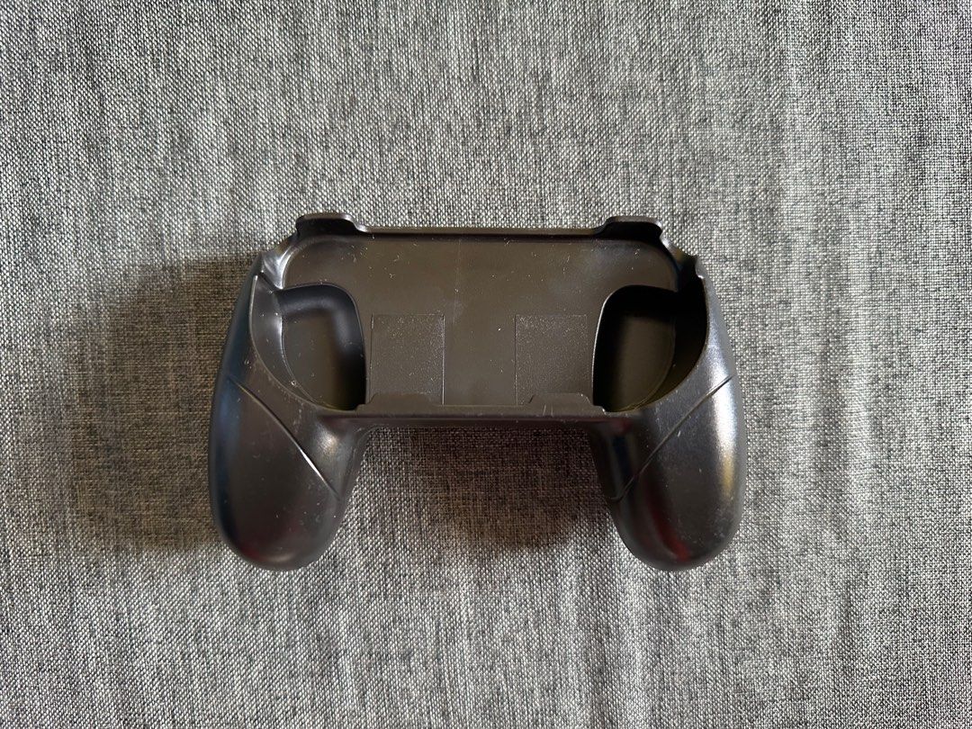Joy-Con Grip Holder for Nintendo Switch (Category: Cases & Covers) located in Marikina City. Submitted by johngabrielrana (Listing ID 1289058668, Image 2). Description: Joy-Con Grip Holder for Nintendo Switch. Designed by Yamadakagaku in Japan. The item is brand new. Just putted out the item to take picture. It is bought from Japan. RFS: Decluttering. I never able to use it. For more information, please message me! Payment Options: Cash, GCash, o