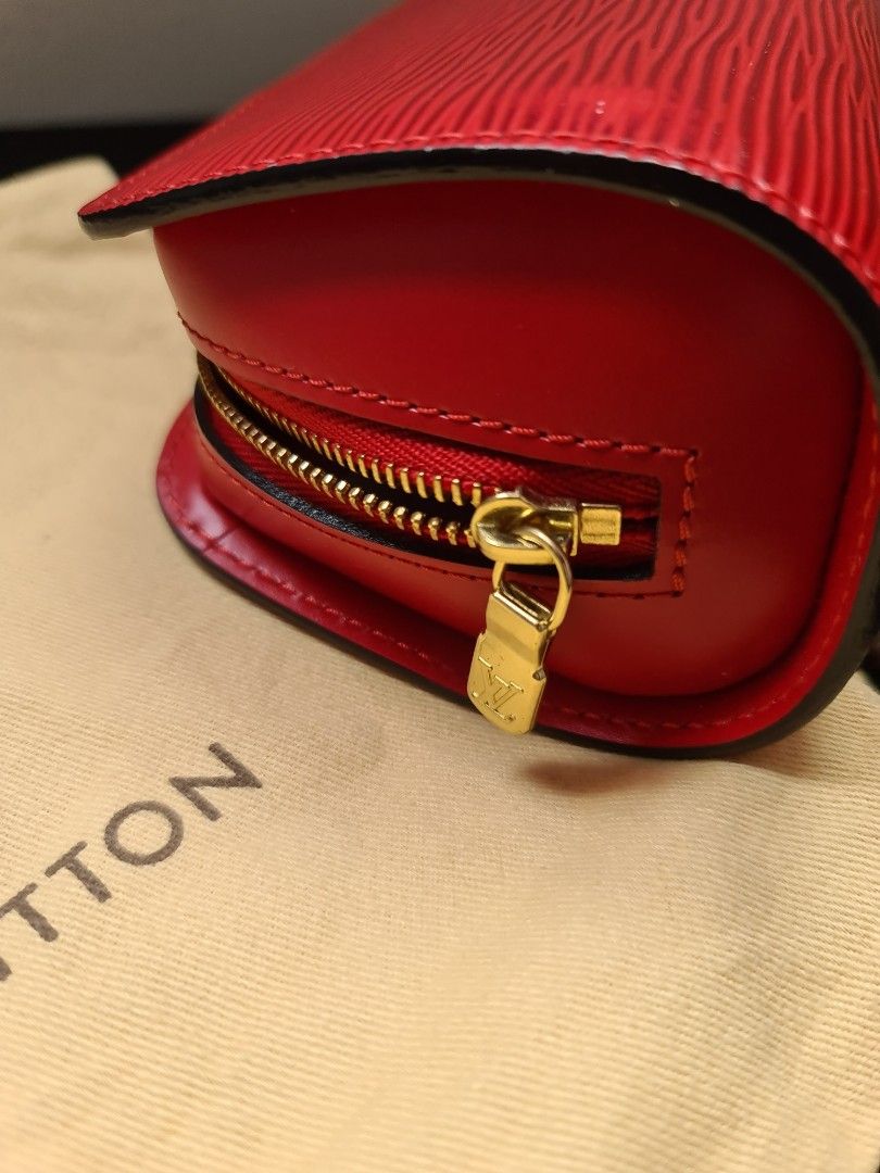 LV Dauphine Epi Leather Pouch (Category: Luxury Bags & Wallets) located in Mandaluyong City. Submitted by the_luxury_hub (Listing ID 1289034087, Image 2). Description: LV Dauphine Epi Leather Pouch 11k *outer condition is pristine zipper and puller still gold, no tarnish, no chipping no rubs on all sides *inner condition: cleaned, removed peeling coat..
