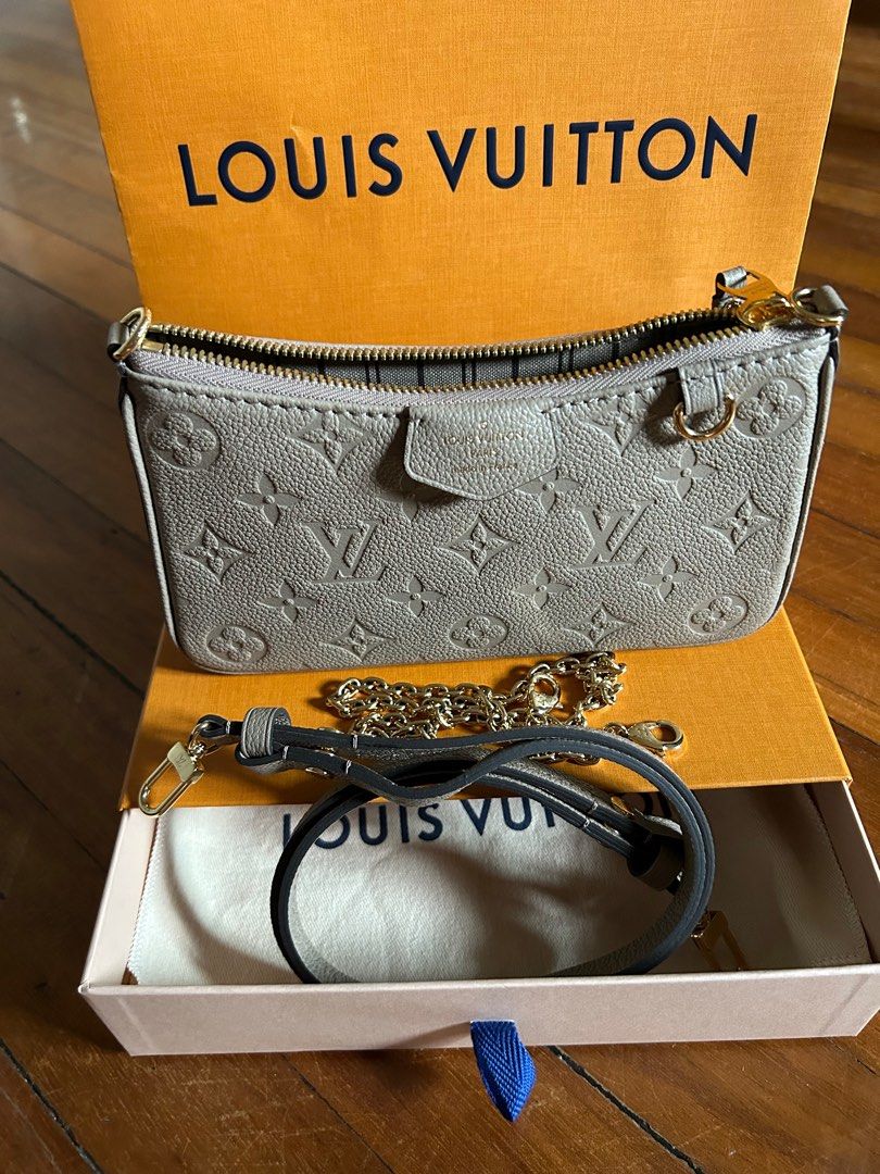 LV sac easy pouch on strap (Category: Luxury Bags & Wallets) located in Makati City. Submitted by myterry1941 (Listing ID 1289062649, Image 1). Description: Recent purchase almost brand new condition LV sac easy pouch on strap Monogram empreinte leather Beige color Comes with box and dust bag Sourced in Europe 2024 February .