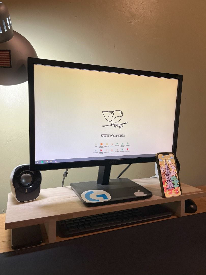 Monitor Riser Stand - Mini (Category: Desktops) located in Kuala Lumpur. Submitted by muraiwoodworks (Listing ID 1289143135, Image 1). Description: - Ready stock - Handmade - Solid Rubberwood - Dimensions : 60cm x 25cm x 7cm - Built in phone holder (right hand side) - Available in Natural and Mahogany finishes * Custom sizing is available, If you want SMALLER than this size there will be NO ADDITIONAL CHARGES. However if you want BIGGER/LONGER th
