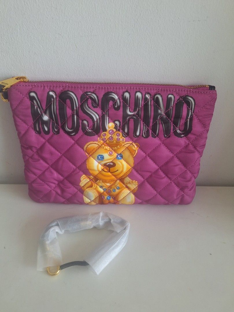 Moschino purple unisex quilted clutch bag