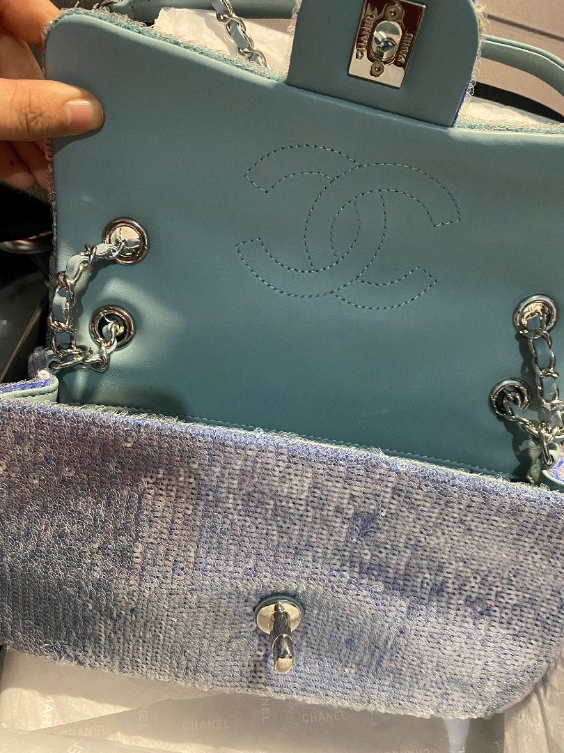 RARE CHANEL 😍 CC FLAP SILVER SEQUENCE BLUE BAG (Category: Luxury Bags & Wallets) located in Pasig City. Submitted by gluxerare (Listing ID 1289119709, Image 2). Description: Must have bag! Rare & Super Pretty! 🥰 Rush Sale na! From 24.5k! 🌸 24.5k-28k+ po ang bentahan nito 🌸 What you see is what you get! Mas Maganda pa sa Personal! <3 Perfect for OOTD bag, daily bag, Gift or Reward for yourself / loved ones! Giftable! Complete Inclusions Box, D