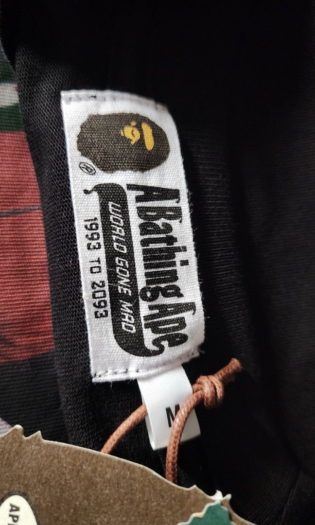 Bape shirt (Category: Tshirts & Polo Shirts ) located in Manila. Submitted by microus (Listing ID 1289240489, Image 2). Description: Price DROP unti Mar 31, 2024 only from 5,900 to 5k only brandnew with paperbag Size Medium - mens.