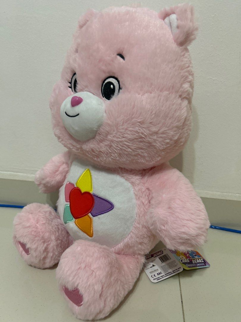 Pink care bear with heart and sun 2025