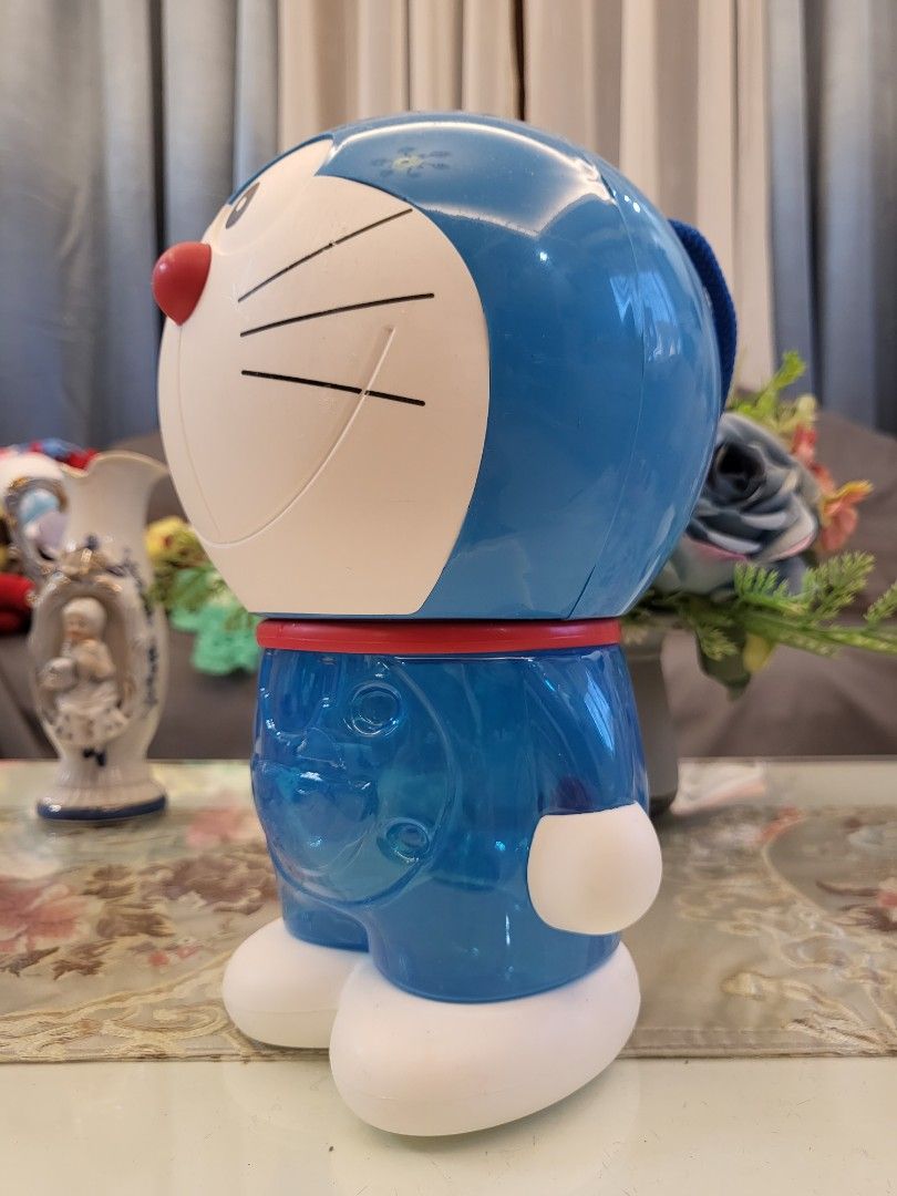 Doraemon Large Plastic Coin Bank w/ Strap (Category: Character Goods) located in San Fernando. Submitted by jpmarketplace2023 (Listing ID 1289365271, Image 3). Description: 💚 All items are authentic from Japan. 💛 MOP: GCash (❌️ GCash Protect) 🩵 MOD: LBC only (❌️ S. Checkout, COD, COP) 💙 Meet-up: Vista Mall, San Fernando, Pampanga 💜 All items are on-hand. 🧡 First to pay gets the item first. ❤️ Breakable items are packed with care and caution