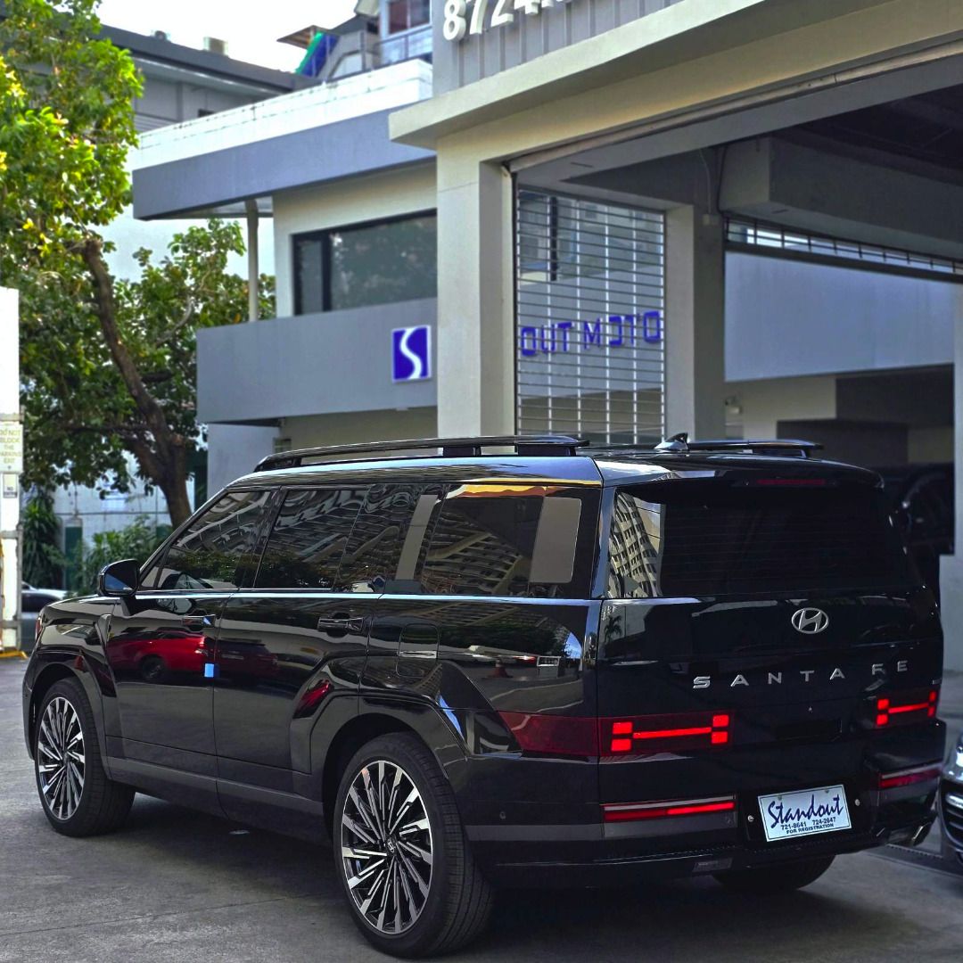 Hyundai Santa Fe Calligraphy Auto (Category: New Cars) located in Quezon City. Submitted by standout1595 (Listing ID 1289331733, Image 3). Description: 2024 Hyundai Santa Fe 2.5T 2.5L Turbocharged Gasoline Engine 277-HP with dual-clutch 8-Speed Automatic Transmission 12.3-inch Infotainment and 12.3-inch Digital Gauge Cluster Bose Speakers Napa Leather Seats Dual Wireless Charging & UV Sterilization Compartment 21" Alloy Wheel Adaptive Cruise Cont