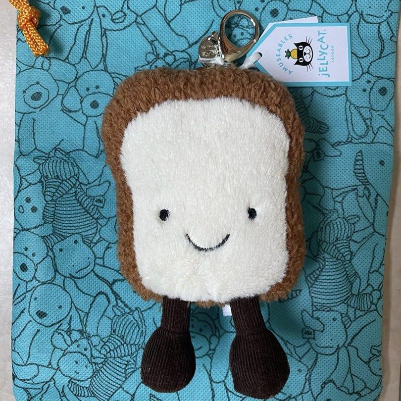 Jellycat amuseable toast bag charm Hobbies Toys Toys Games