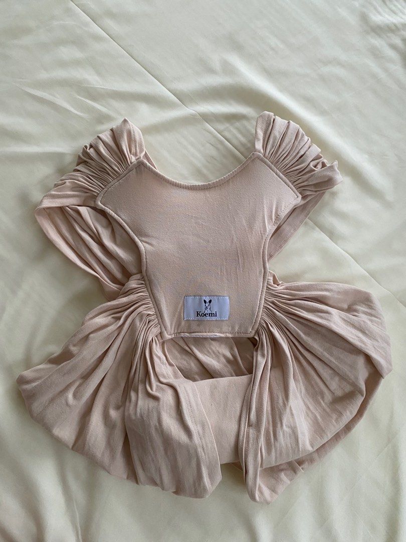 ORIGINAL KOEMI SLING BABY CARRIER (Category: Carriers & Slings) located in Paranaque City. Submitted by novatorres (Listing ID 1289323820, Image 1). Description: For sale: KOEMI Sling Baby Carrier P1,200 Color: Wheat Size: Small-Medium Washed, ready to use. like brand new, no box. Used only to try & practice maybe 3x at home (never worn outside) but I prefer stroller. RFS: using stroller. Na-stock lang. Original price: 1,500.