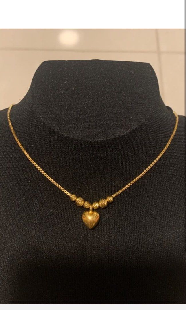 Gold necklace top in box
