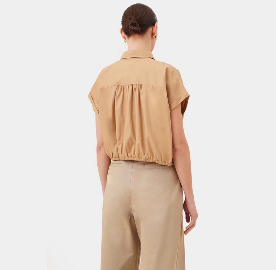 Bocu Cap Sleeve Draw Hem Cropped Shirt (Category: Blouses) located in Caloocan City. Submitted by gold_m (Listing ID 1289541022, Image 2). Description: - Fit: Boxy - Design Details: Regular Collar, Button Up, Cap Sleeves with Fixed Cuff, Shirred Back Yoke, Adjustable Self Tie Hem - Material Composition: 100% Cotton.