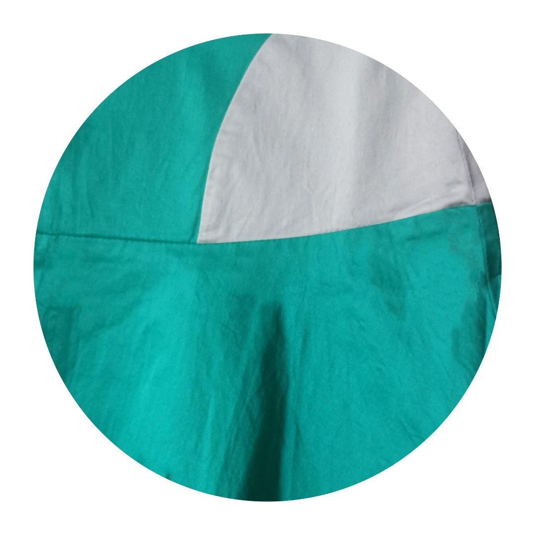 Green skirt top trumpet music video