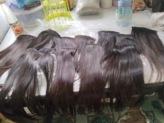 Human hair extension with clip on