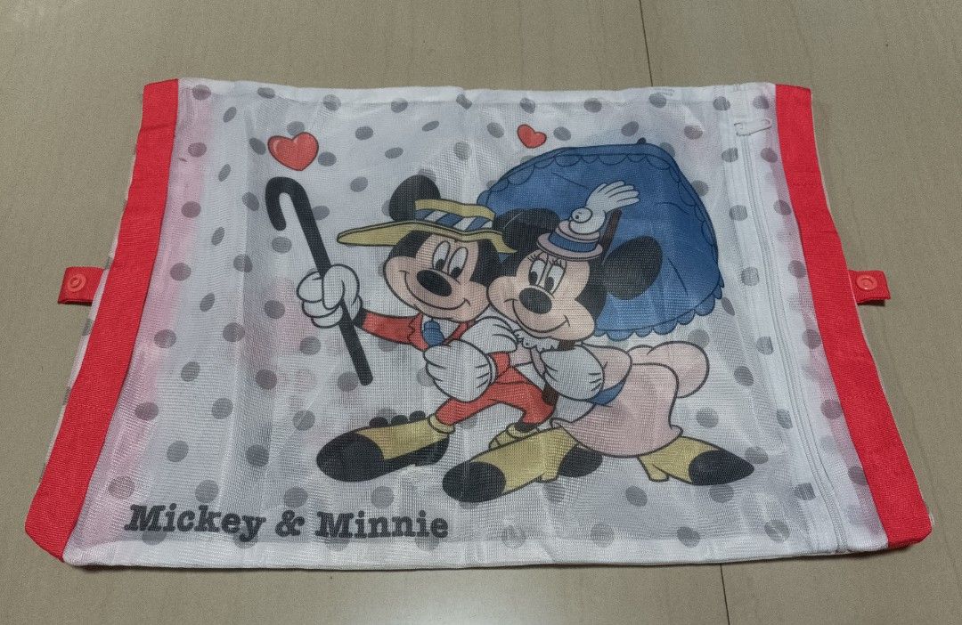 Mickey and Minnie Mesh Laundry Bag Storage (Category: Laundry Baskets) located in Makati City. Submitted by twentyfourteen (Listing ID 1289617640, Image 1). Description: Mesh Laundry Bag Good for washing underwear and bra For delicate clothes when using your washing machine Durable and Heavy Duty (tested) ₱70 each Size: Height - 15 inches Width - 11 inches With 2 zippers and 1 button (for folding).