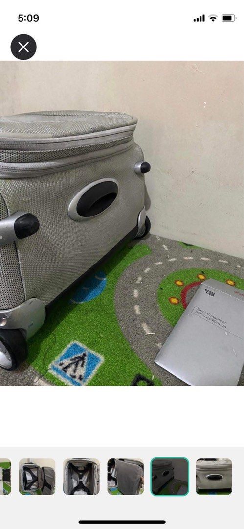 Original TUMI luggage (Category: Luggage) located in Mandaluyong City. Submitted by gabbie_0708 (Listing ID 1289513355, Image 2). Description: Very sturdy, can last for several years Inside is like new, with suit compartment Comes with papers 2 wheels Honest issue: has cracks in the rubber of the wheels Crack in the brand plate.
