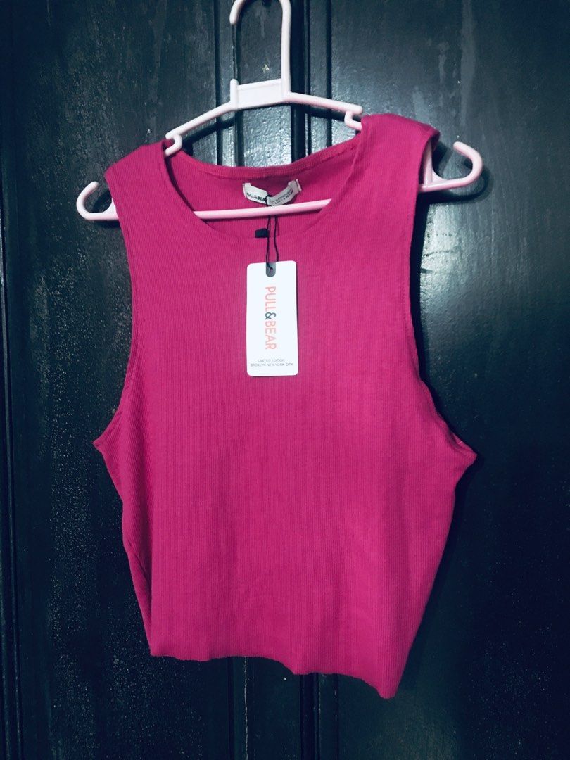 Pull & Bear brand preloved rib knit tank top size Small (Category: Sleeveless) located in Mandaue City. Submitted by pinkbarbiethriftshop (Listing ID 1289589115, Image 1). Description: The white spots are from the mirror..