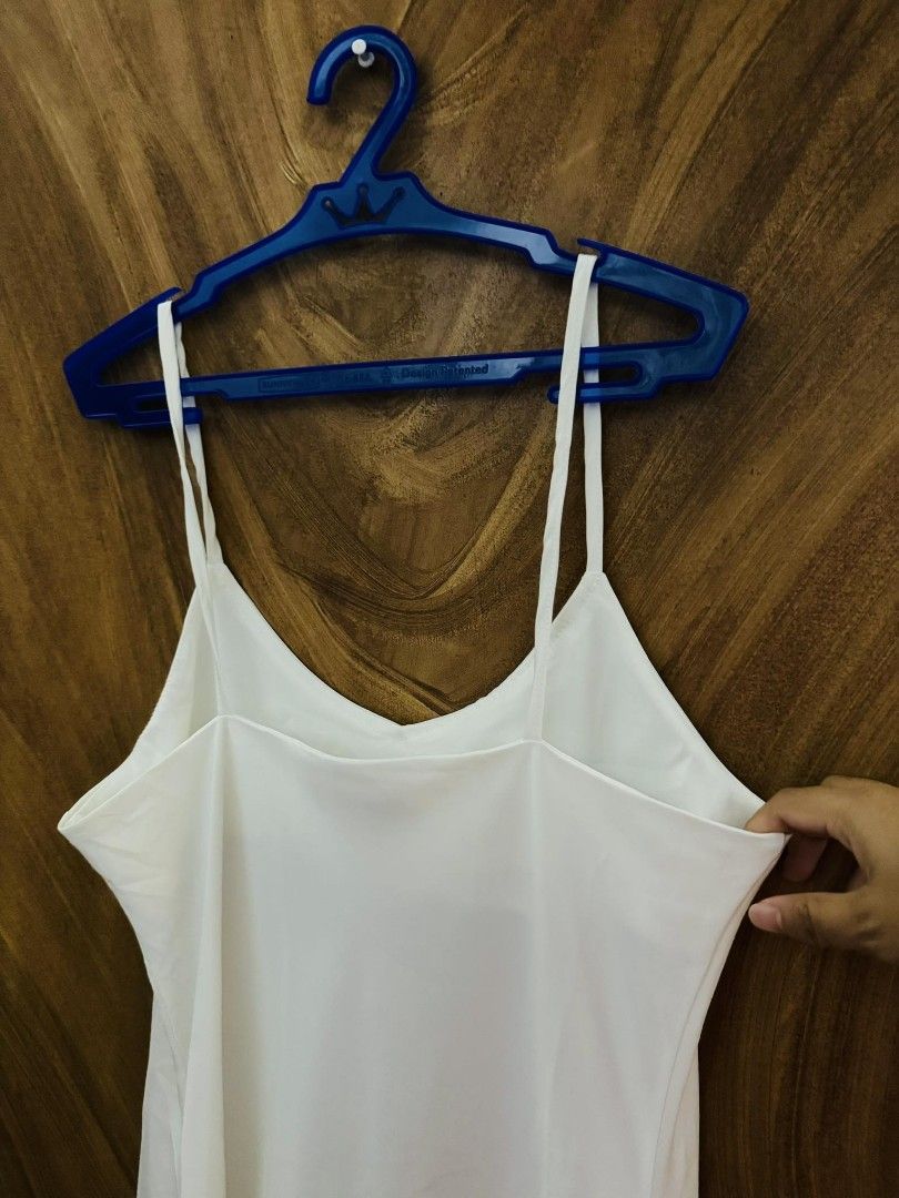 Strappy White Midi Dress (Category: Dresses) located in Pasig City. Submitted by itsrubyred (Listing ID 1289598658, Image 2). Description: 📌Pwedeng pang prep dress sa Wedding . 📌 Small to Medium Frame 📌 Not adjustable strap.