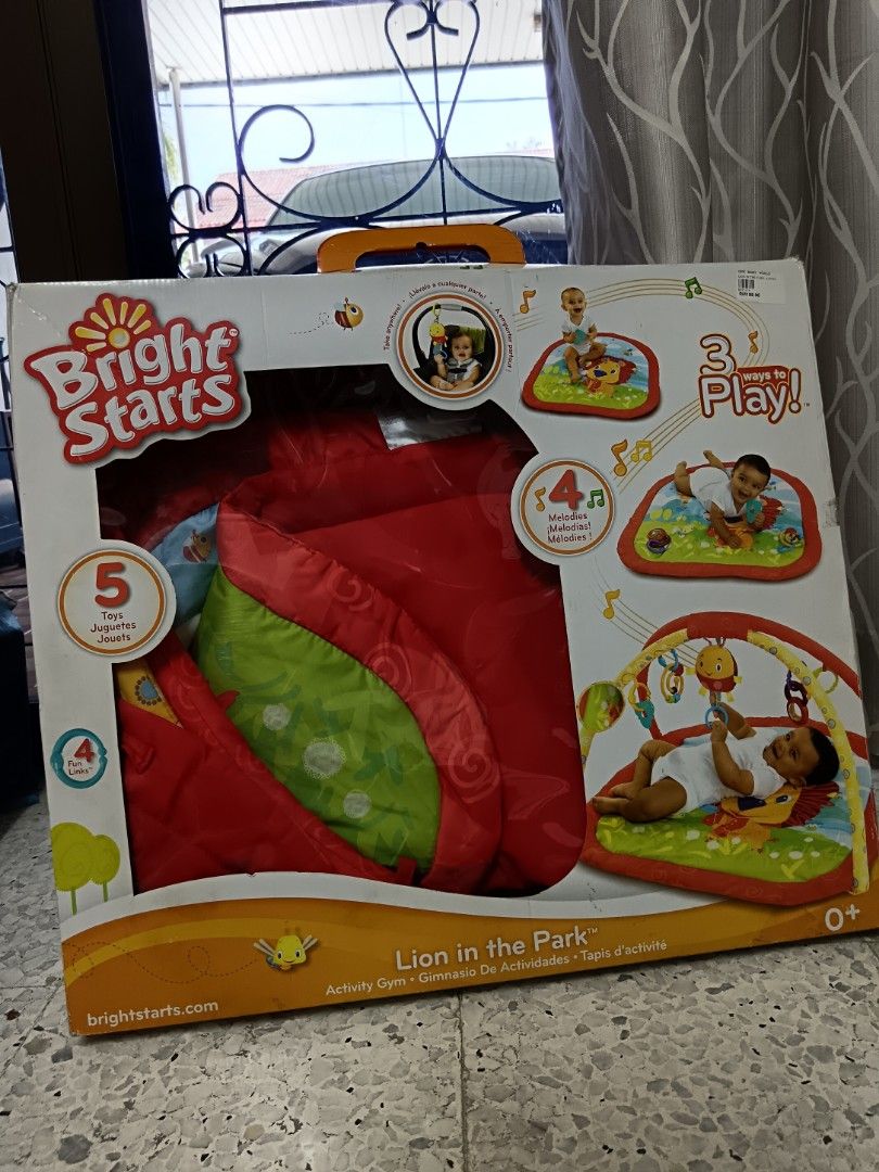 Bright starts lion in the park activity gym sales