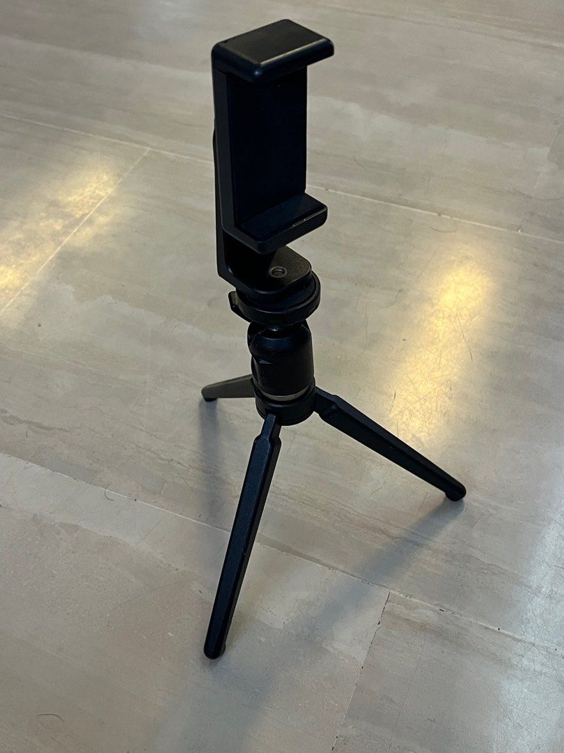 Tripod (Category: Tripods & Monopods) located in Singapore. Submitted by creativeleonard (Listing ID 1289673307, Image 6). Description: This is a made in Italy 420 pro ball head tripod fitted with an adapter for your mobile phone for vlogs etc. Very pro, very secure. Of course, you can also fit in a base for your small DSLR of point and shoot camera. Very sturdy and comfortable to hold. .