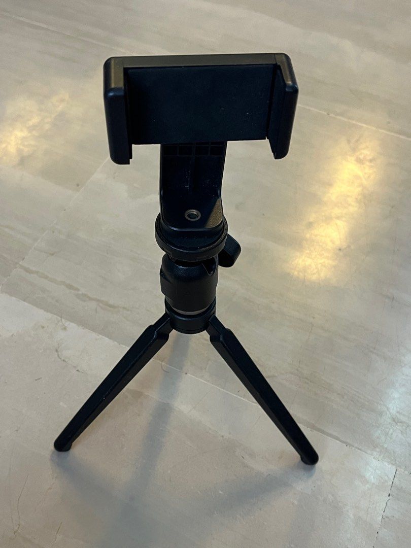 Tripod (Category: Tripods & Monopods) located in Singapore. Submitted by creativeleonard (Listing ID 1289673307, Image 7). Description: This is a made in Italy 420 pro ball head tripod fitted with an adapter for your mobile phone for vlogs etc. Very pro, very secure. Of course, you can also fit in a base for your small DSLR of point and shoot camera. Very sturdy and comfortable to hold. .