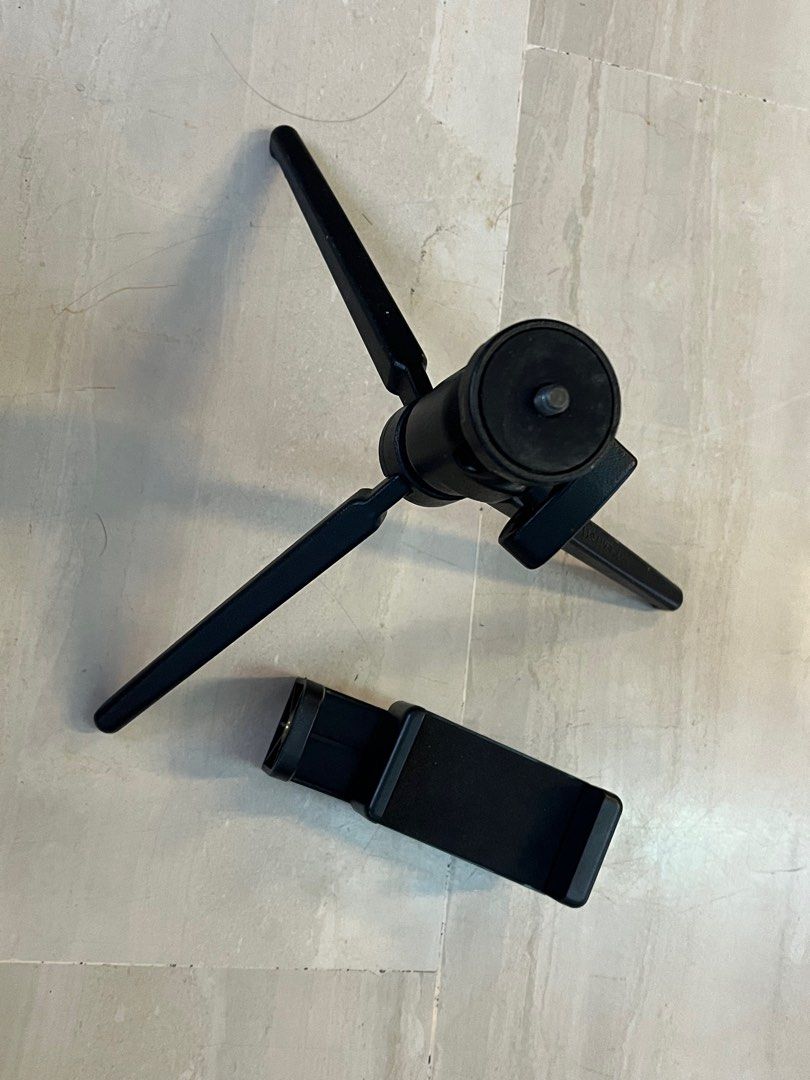 Tripod (Category: Tripods & Monopods) located in Singapore. Submitted by creativeleonard (Listing ID 1289673307, Image 8). Description: This is a made in Italy 420 pro ball head tripod fitted with an adapter for your mobile phone for vlogs etc. Very pro, very secure. Of course, you can also fit in a base for your small DSLR of point and shoot camera. Very sturdy and comfortable to hold. .