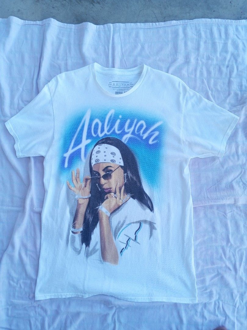 AALIYAH AIRBRUSHED PAINTED SHIRT (Category: Tshirts & Polo Shirts ) located in Manila. Submitted by eothrift (Listing ID 1289697622, Image 2). Description: ❗❗ FREE SHIPPING ❗❗ Condition: Good Size: Medium on Tag Dimension: W: 18 - L: 28.5 Issue: light yellow stain washable (see last picture) Color rate: 8 Price: 375 Free Shipping We Ship Nationwide.